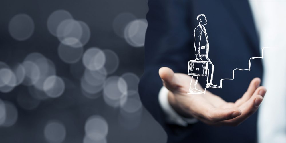 human hand drawing career ladder with chalk text text text