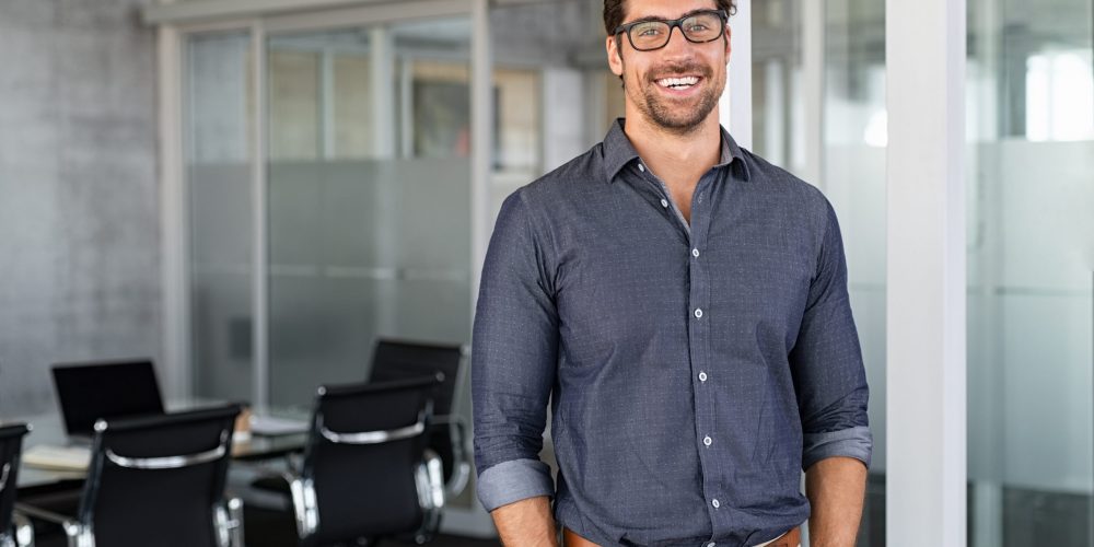 Success businessman smiling in office text text text